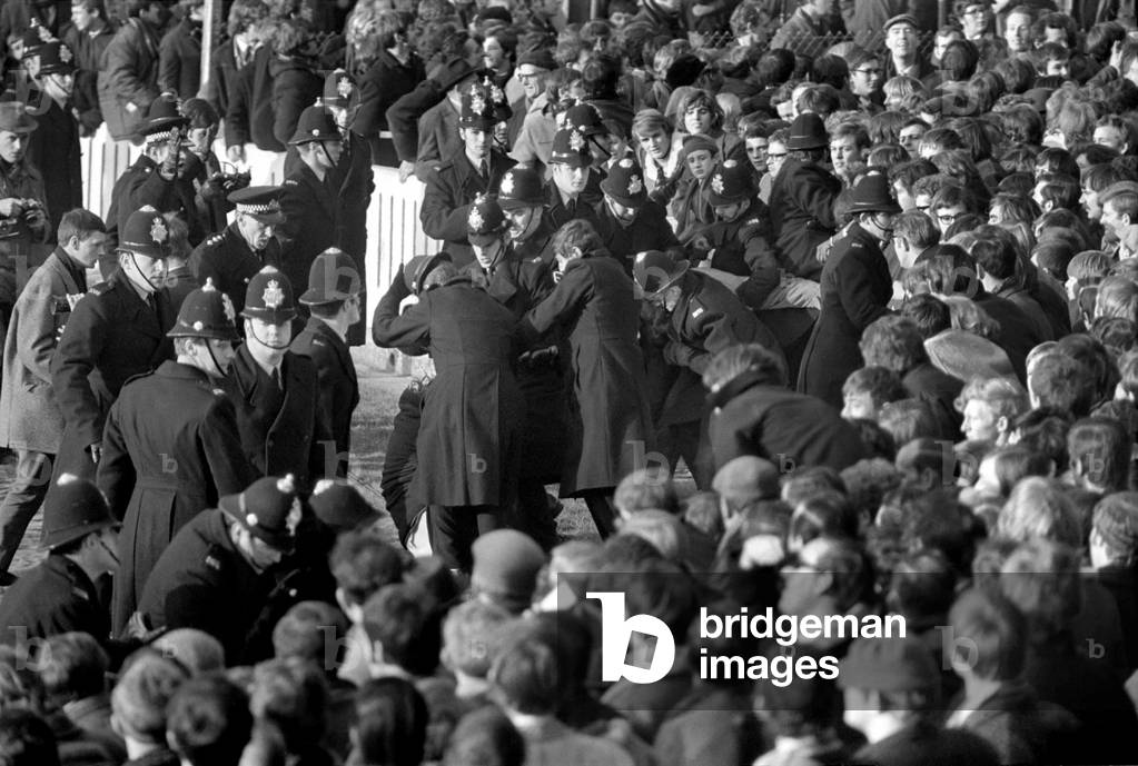 South Africa rugby team visit to Britain. 
Police struggle as demonstrators try to get to the pitch. November 1969