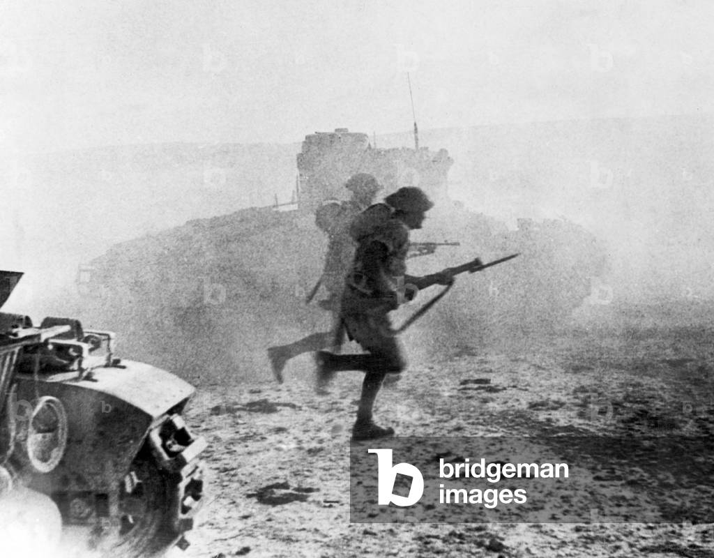 Scots guards go into action at El Alamein. The guards move forward under the protection of a smoke screen and the dust kicked up by the tanks. July 1942