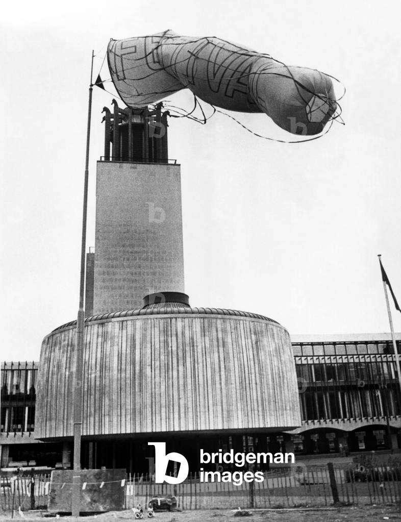 North East Festivals The tattered and battered windsock flying from the Newcastle Civic Centre to promote the Newcastle Festival, 3 October 1972 (b/w photo)