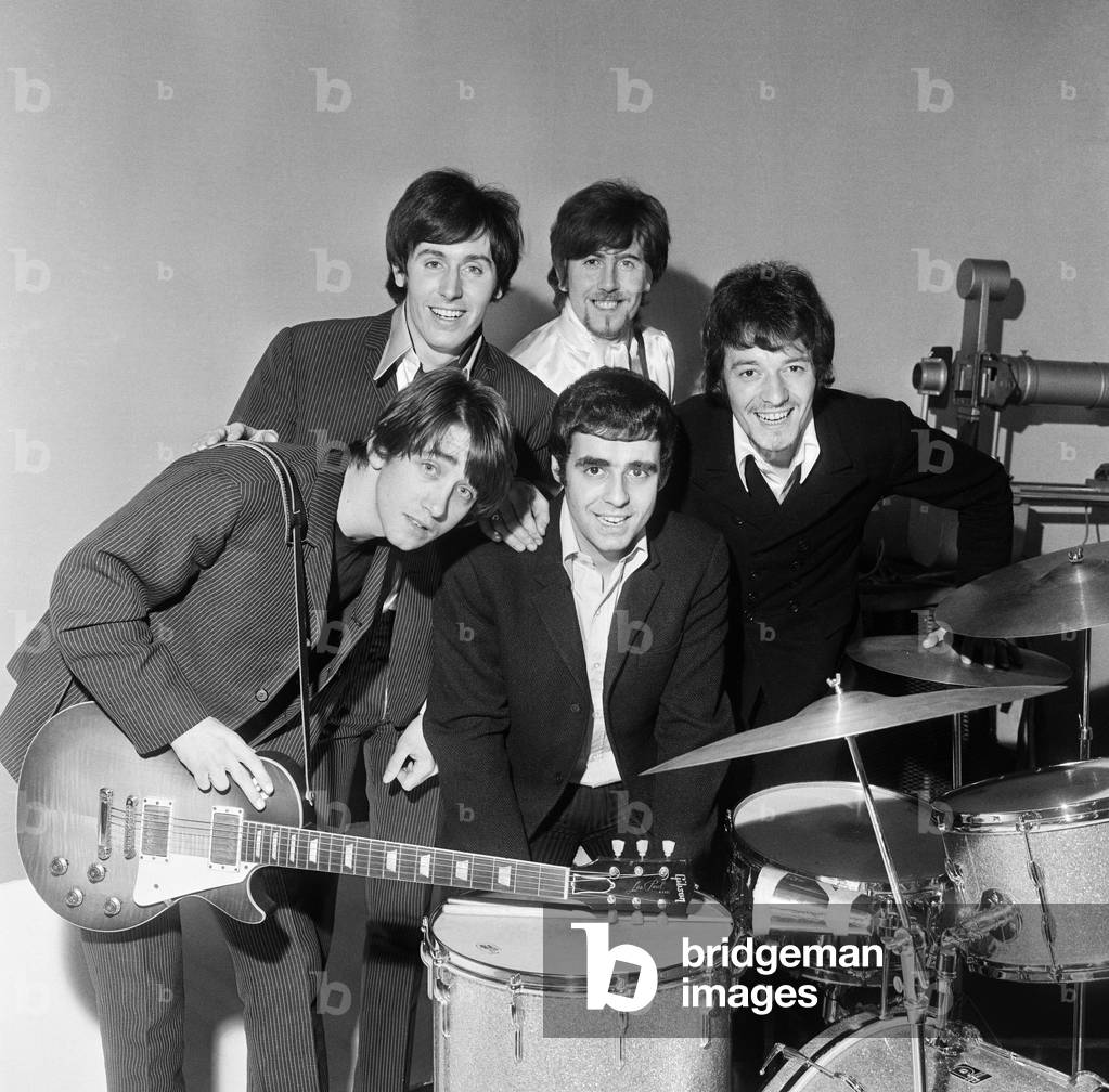 Manchester pop group The Hollies pictured with their stand-in drummer Tony Mansfield during rehearsals for the ABC television show Doddy's Music Box at the ABC studios. 9th March 1967 (b/w photo)