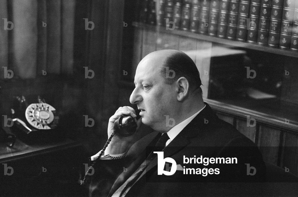 Media mogul Lew Grade pictured in his office at the ATV studios in Great Cumberland Place, London. 21st February 1964 (b/w photo)