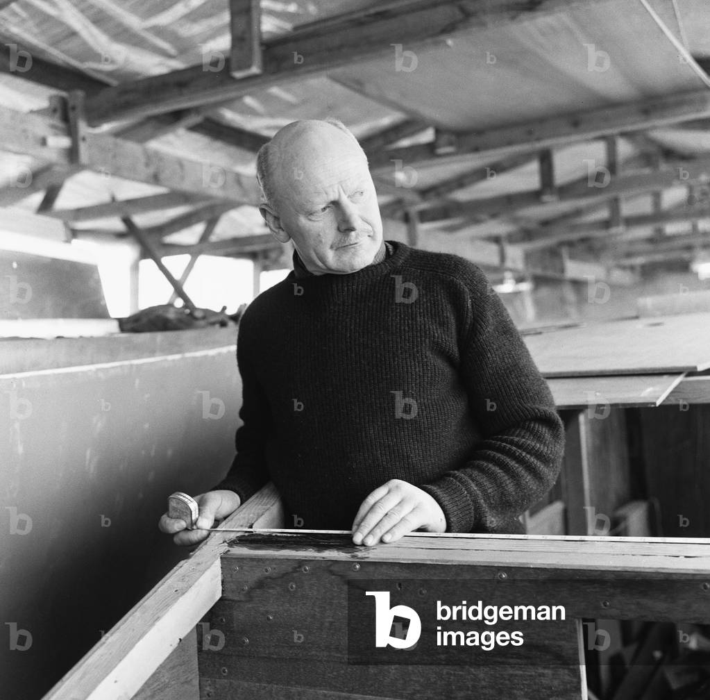 Herbert Hasler one of the Cockelshell heroes, seen here at work on his sloop at the Don Fuller boatyard, Bosham, Sussex. 1st March 1966