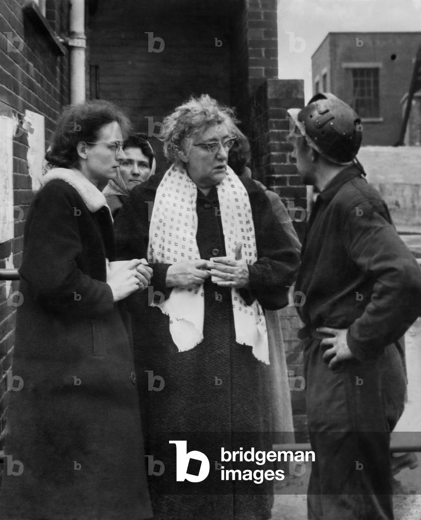 Coal Mining accident at Hapton Valley colliery. Family of one of the miners talking to a worker.