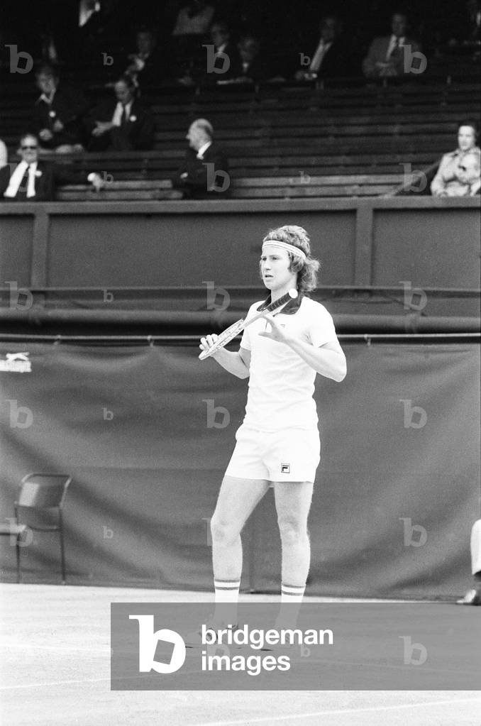 18 year old American John McEnroe seen here in action on Court One at Wimbledon against Australian Phil Dent. McEnroe went on to win and earn him a place in the Mens Semi Final against Jimmy Connors. 28th June 1977