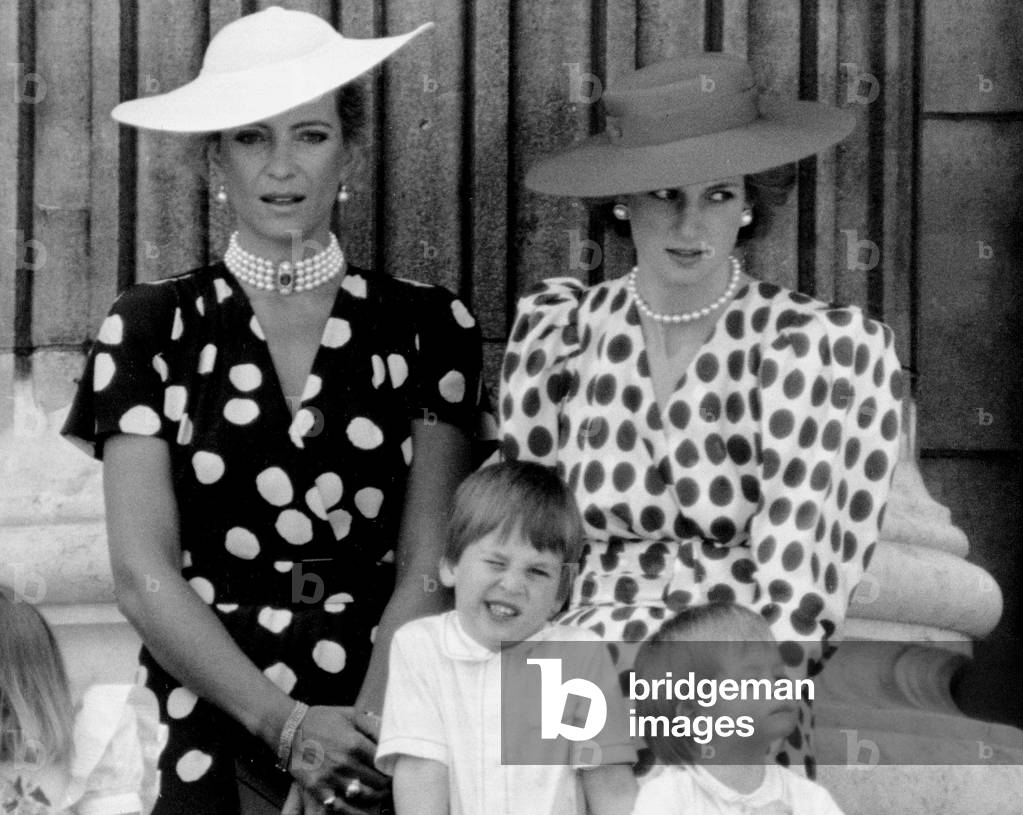 Princess Diana with Princess Michael of Kent, Prince William and Prince Harry on the balcony at Buckingham Palace.
June 1986