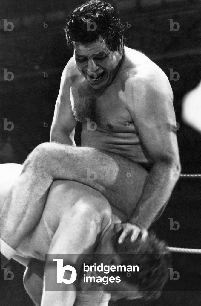 British wrestler Count Bartelli in action against Pete Roberts, 25th April 1971 (b/w photo)
