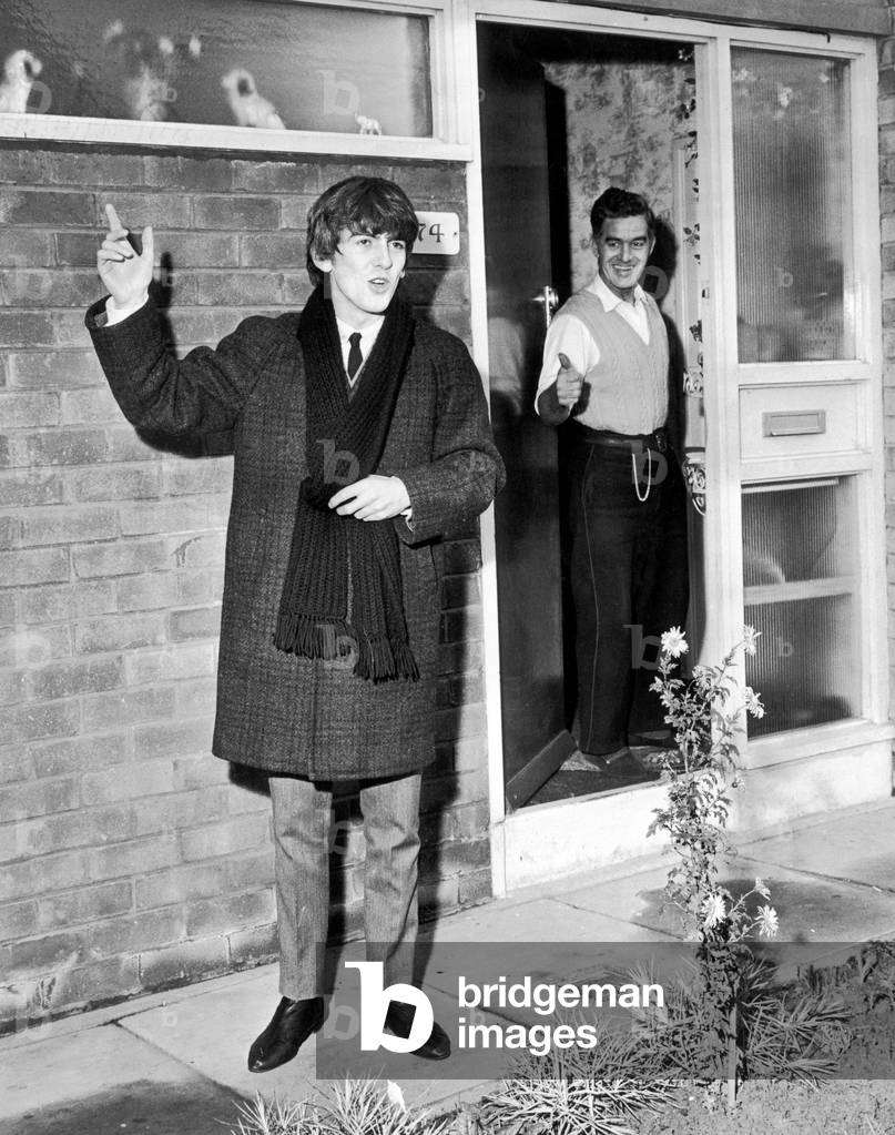 George Harrison saying goodbye to his father Harold Hargreaves Harrison, 7th December 1963. The Beatles are in Liverpool for two live shows for BBC Television, BBC's `It's The Beatles' filmed at the Fans Club Convention.