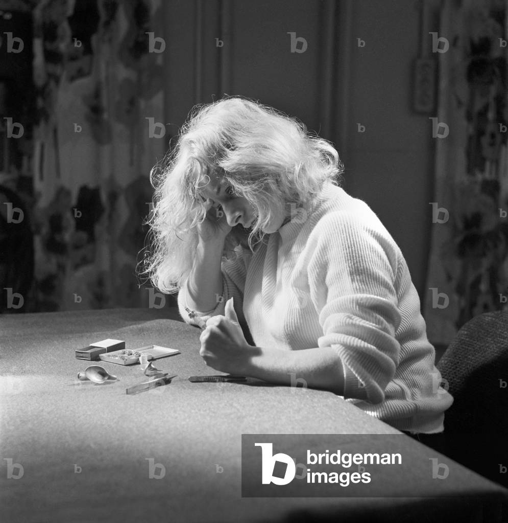 Model shot: Drug addict seen here taking drugs. 1960