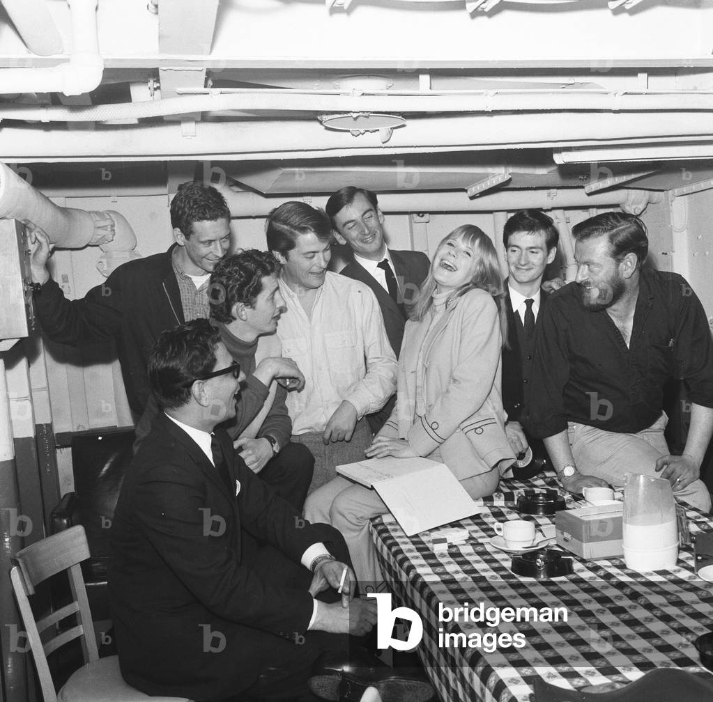 Marianne Faithfull pictured with members of Radio London pictured on the Pirate Radio Ship. 8th May 1965 (b/w photo)