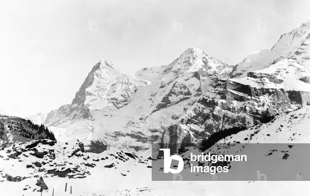 View of the three famous mountains Eiger, Monch and Jungfrau in the Bernese Oberland region of the Swiss Alps, from Murren, Switzerland 1922