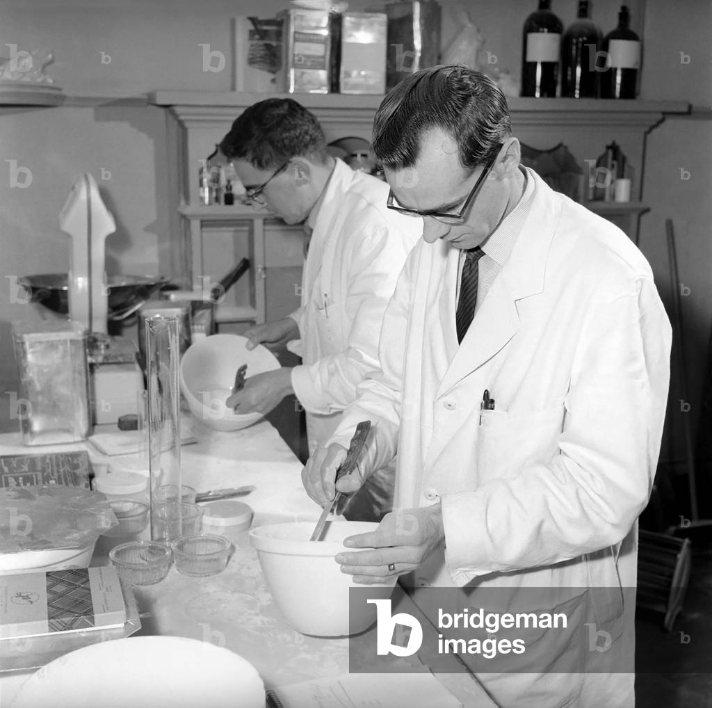 False teeth factory in Dundee: The factory makes and bakes in their kiln (oven) false teeth for all U.K. N.H.S. dentists, 1963 (b/w photo)