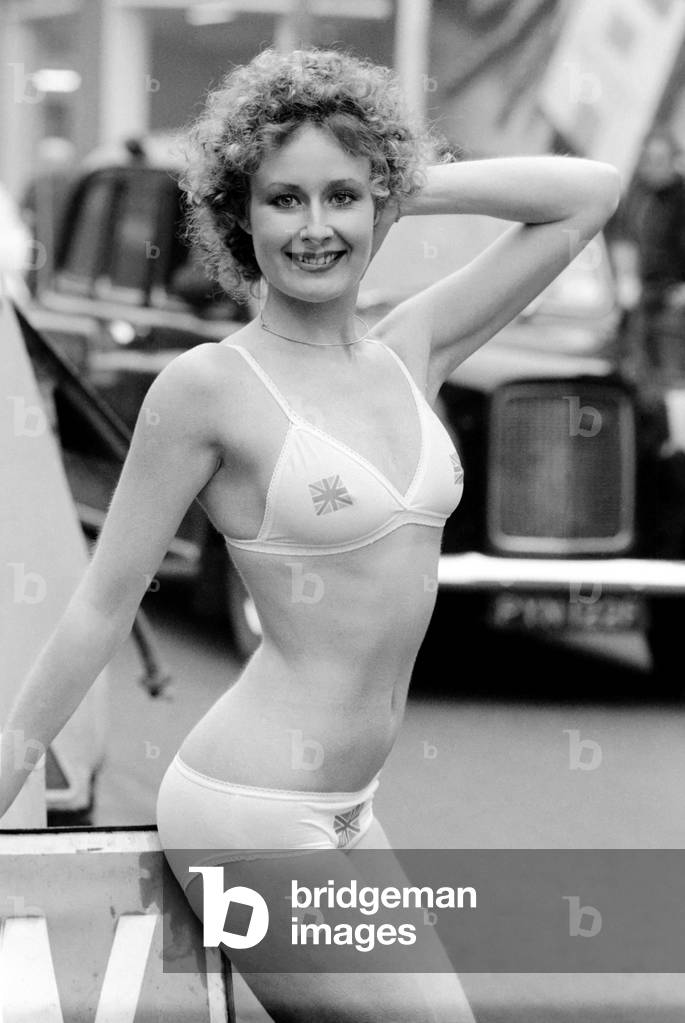 Model Carolyn Wright seen here on the streets of London modelling the 1975 Summer and Autumn Sunarama underwear collection February 1975