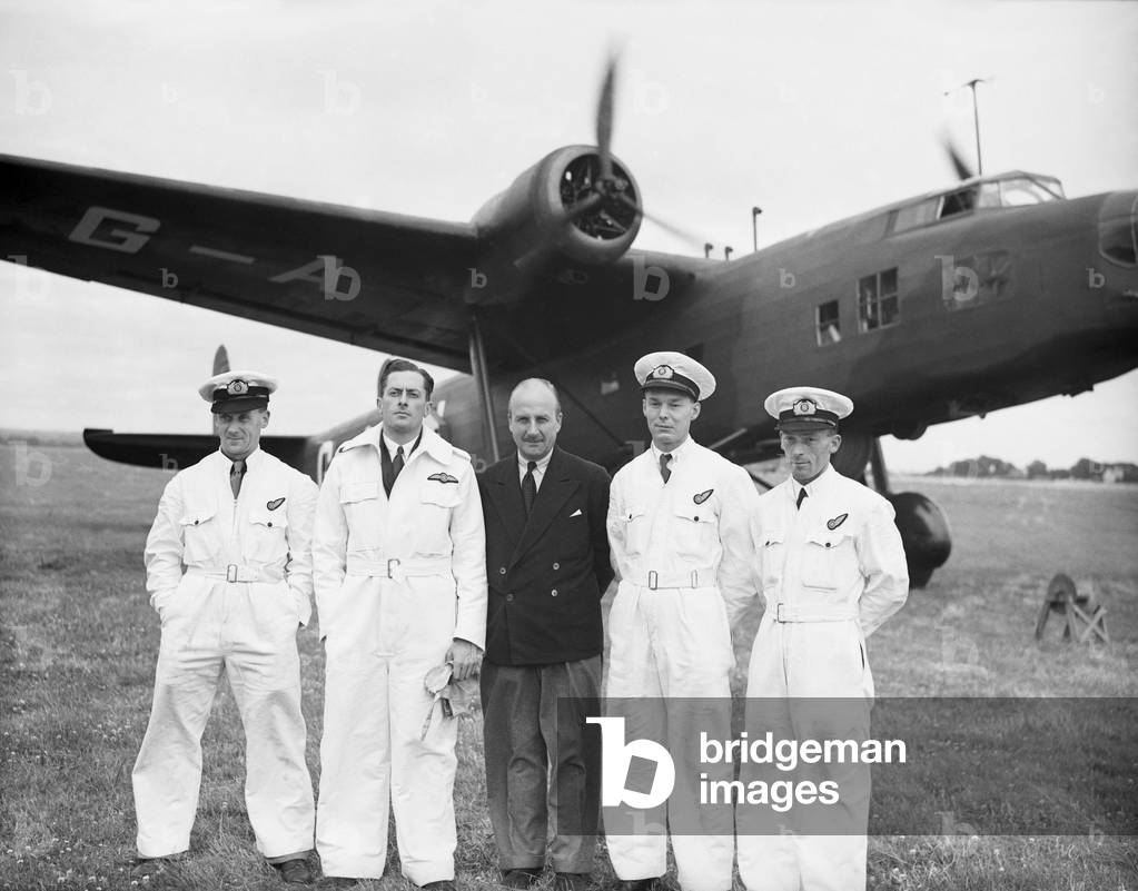 The crew of G-AFRL Handley Page H.P.54 Harrow of Flight Refuelling Ltd pose with Sir Alan Cobham before a demonstration of in-flight refuelling, 28th July 1939 (b/w photo)