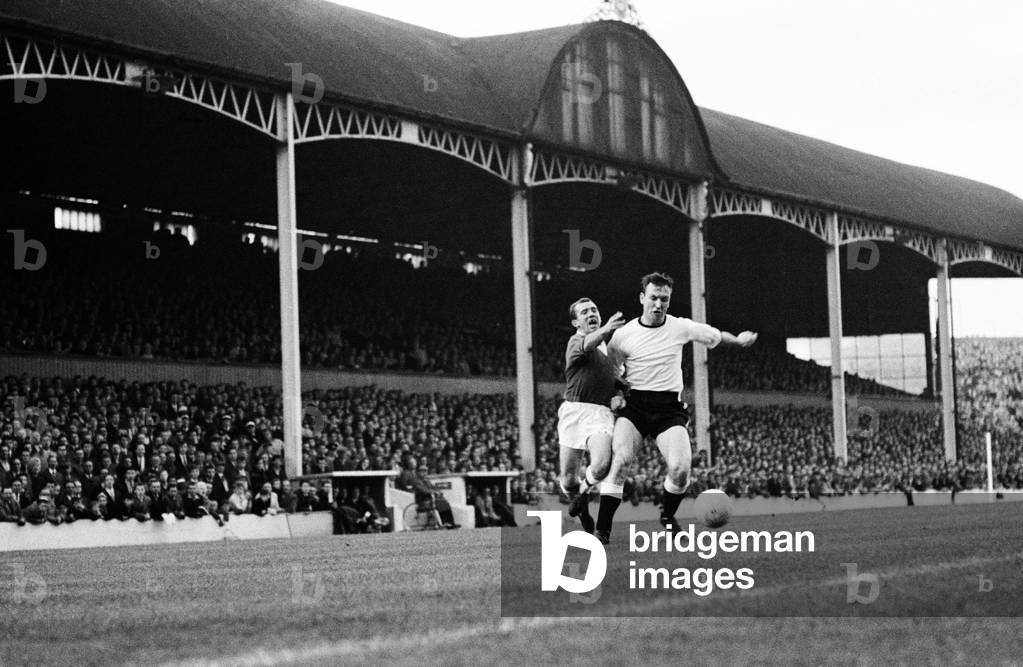 English League Division Two match at Ayrseome Park. Middlesbrough 2 v Rotherham United 2. Peter Maddren of Rotherham wards off Arthur Kaye of Middlesbrough in this battle for possession. 9th September 1963 (photo)