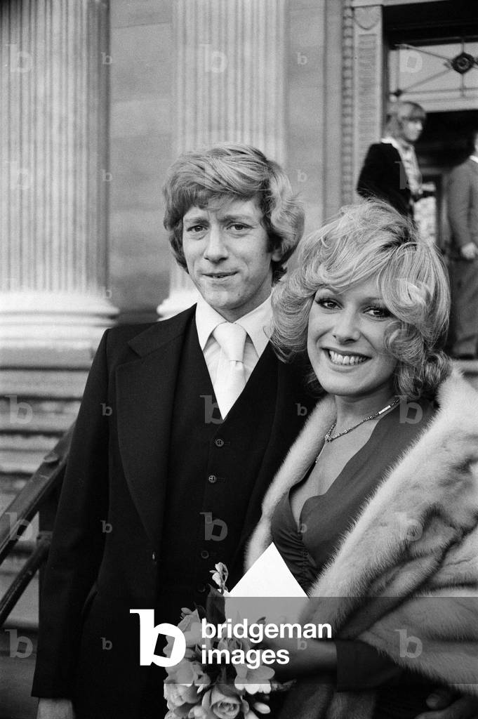 Greg Smith marries Lynda Bellingham, who is to star in his next film 'Confessions of a Driving Instructor', at Marylebone Registry Office. 7th November 1975 (b/w photo)
