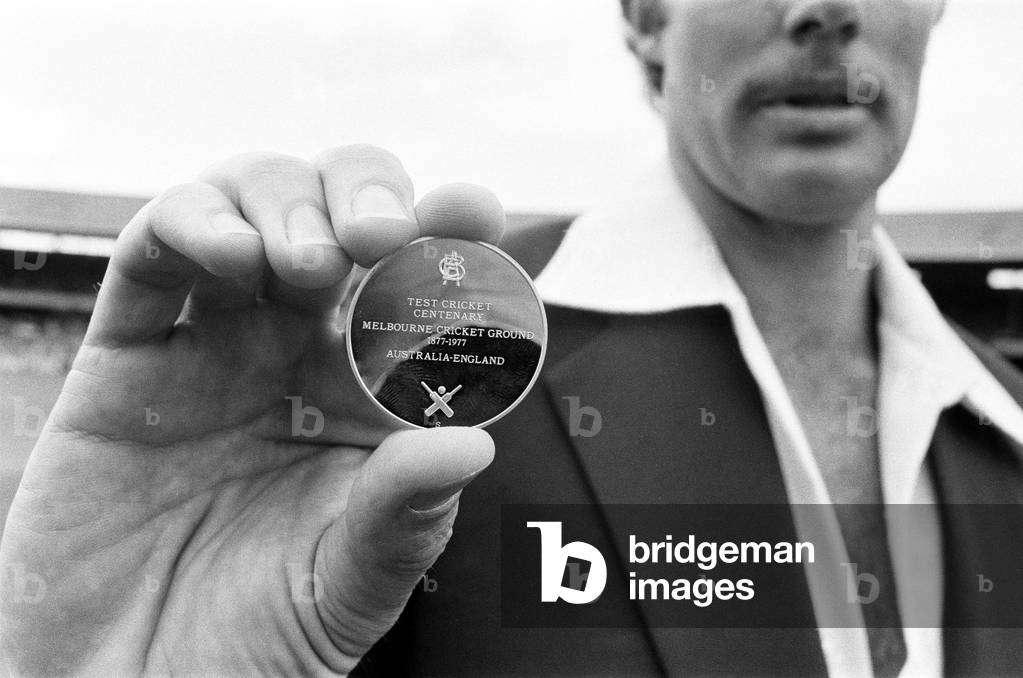 Centenary Test match between Australia and England at The MCG Cricket Ground, Melbourne, Australia.
Australian captain Greg Chappell with a commemorative match coin.
12th March 1977.