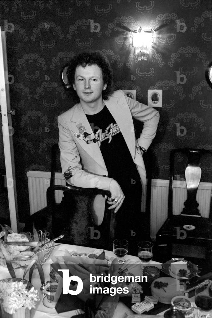 Composer Mike Batt seen here at the home of Sonia Allison, 14th March 1975 (b/w photo)