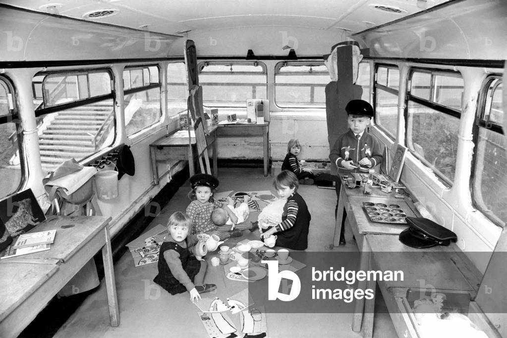Paddington playmobile on a double decker bus. The first of the youngsters who will use the bus at play on the top deck. 
December 1969