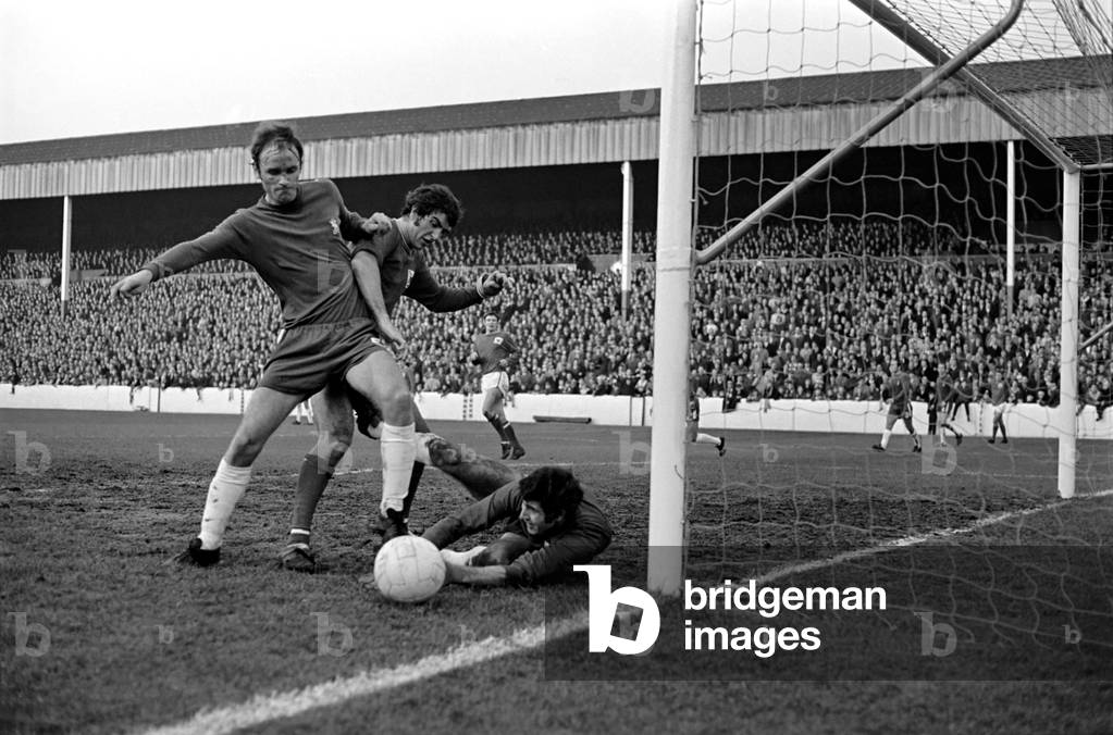English League Division One matchNottingham Forest 1 v Chelsea 1. John Dempsey assists keeper Peter Bonetti in stopping a Forest attack. November 1969 (photo)