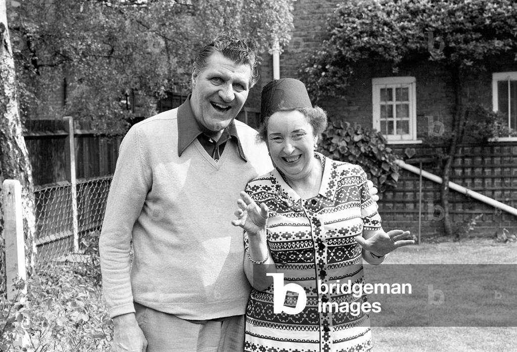 Tommy Cooper and wife Gwen, pictured together in garden of their home, May 1976.