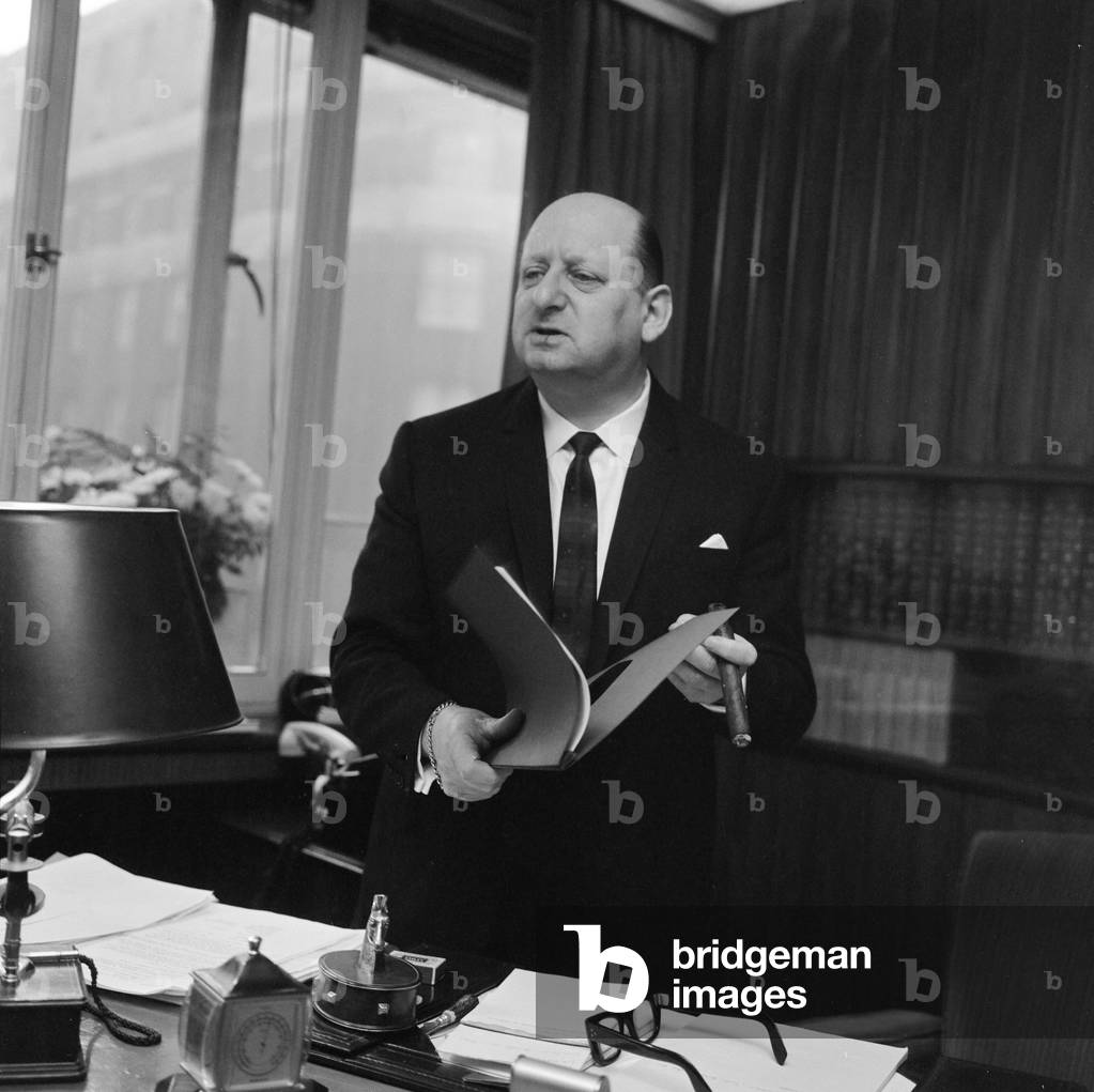 Media mogul Lew Grade pictured in his office at the ATV studios in Great Cumberland Place, London. 21st February 1964 (b/w photo)