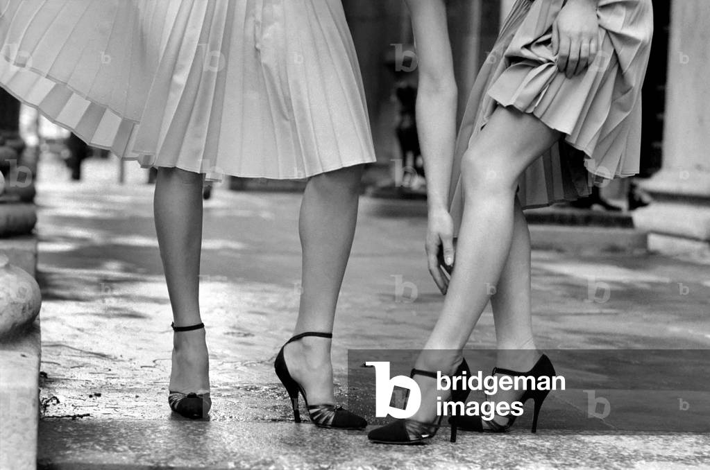 Lara and Chris wearing the new design stiletto heel, 3rd March 1975 (b/w photo)