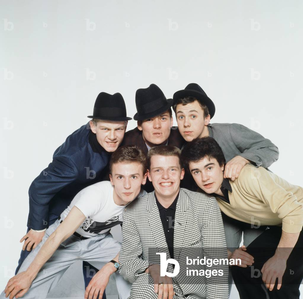 Pop group Madness pose in the Daily Mirror Studio, minus member Lee Thompson. 11th February 1980 (photo)