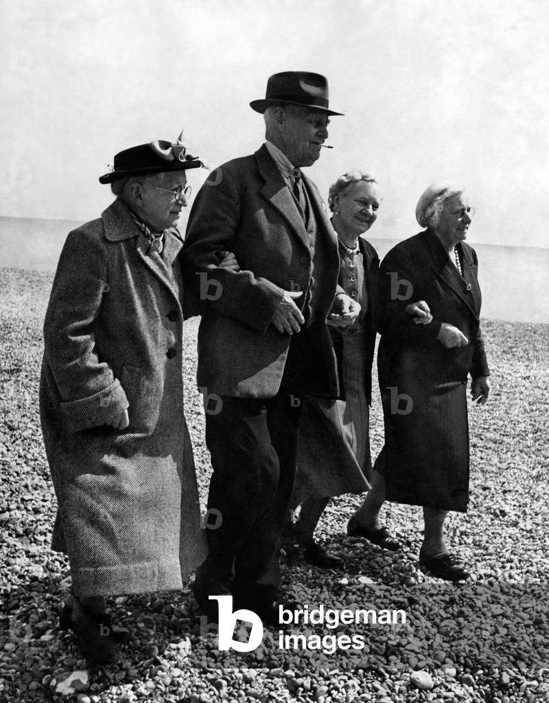 Old people go for walk on the pebbled ground at a Holiday Hotel in Boxhill, Surrey 
May 1949
