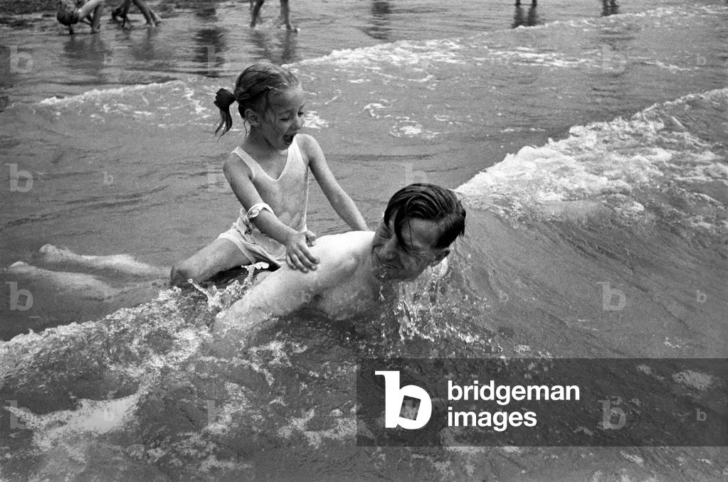 In surf at Brighton - Gladys Tester. August 1952 C3867-001