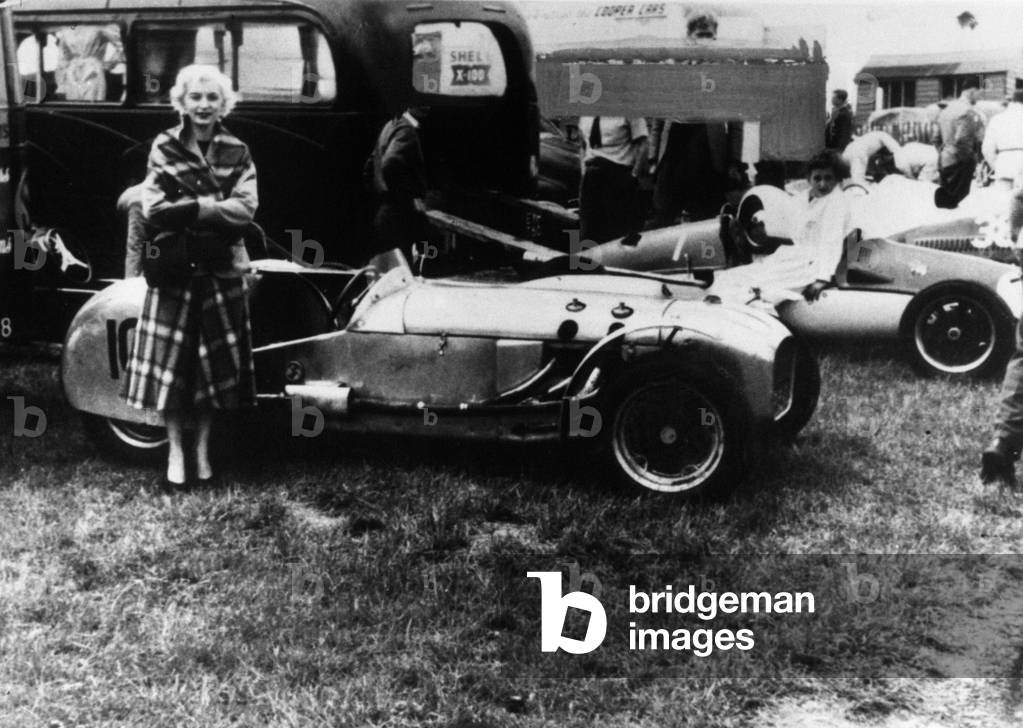 Ruth Ellis seen here posing beside David Blakely car at Brands Hatch in happier times (b/w photo)