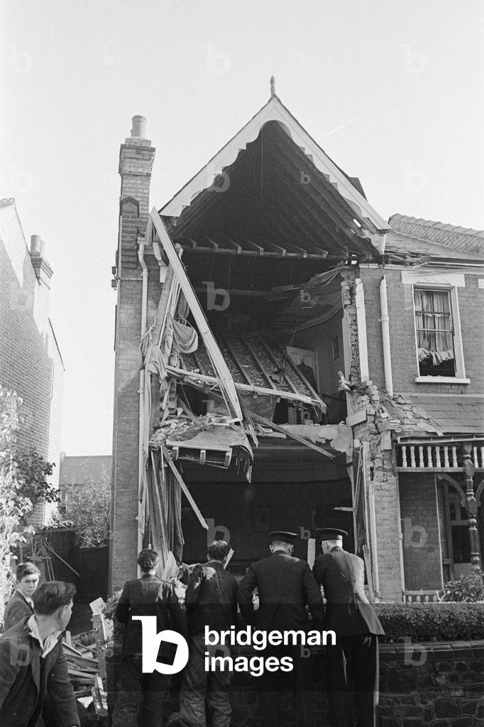 V2 Rocket incident at Tewkesbury Terrace, Bounds Green Road, Southgate. Parts of the rocket after the explosion. 16th September 1944 (b/w photo)
