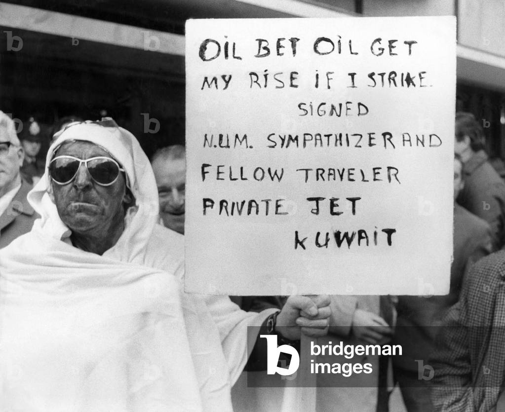 Miner's leaders call strike ballot. 55 year old Frank Marsh, a pithead Bath Attendant from Tower 4 Hirwaun, Glamorgan, dresses up for today's meeting, after travelling with coach loads of colleagues from Wales to demonstrate outside Union HQ. January 1974 P017753