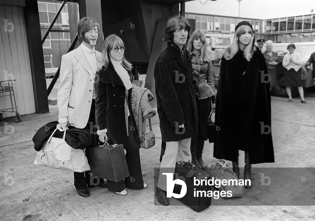 John Lennon with wife Cynthia and George Harrison and his wife Patti Boyd at Heathrow Airport off to India, February 1968 (b/w photo)