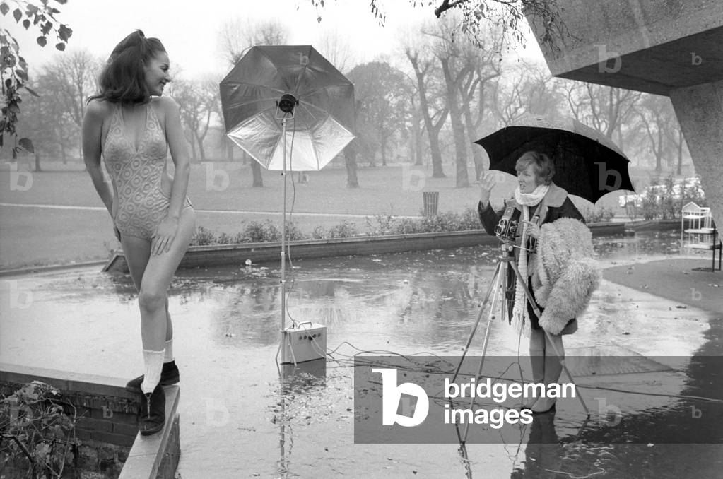Swimming costume. Model Marion Proffitt wearing a Turquoise Lycra one-piece swimsuit cut low at the sides, by Trend. This suit will be in the shops in the new year (1970) and will retail for approx. 145 shillings. November 1969