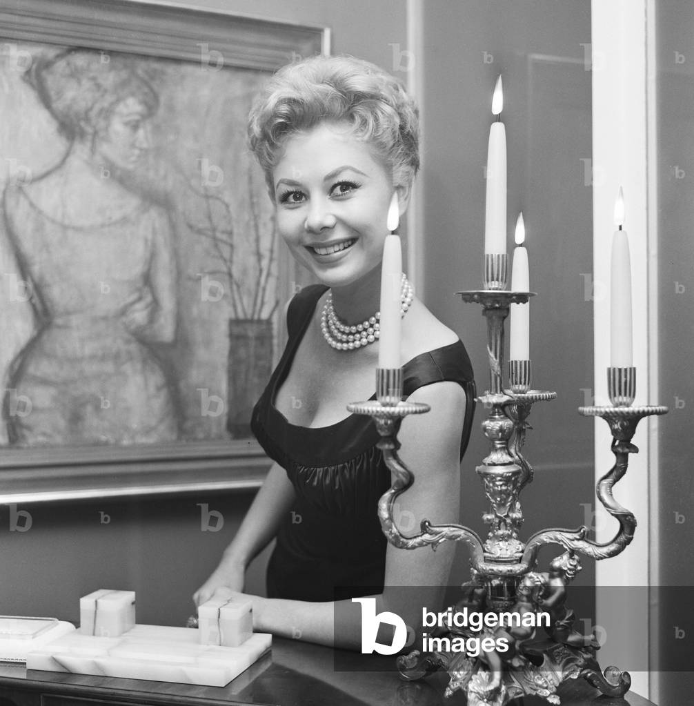 Mitzi Gaynor, American actress, singer & dancer, who is in the UK to start work on new film 'Surprise Package', pictured November 1959 (b/w photo)