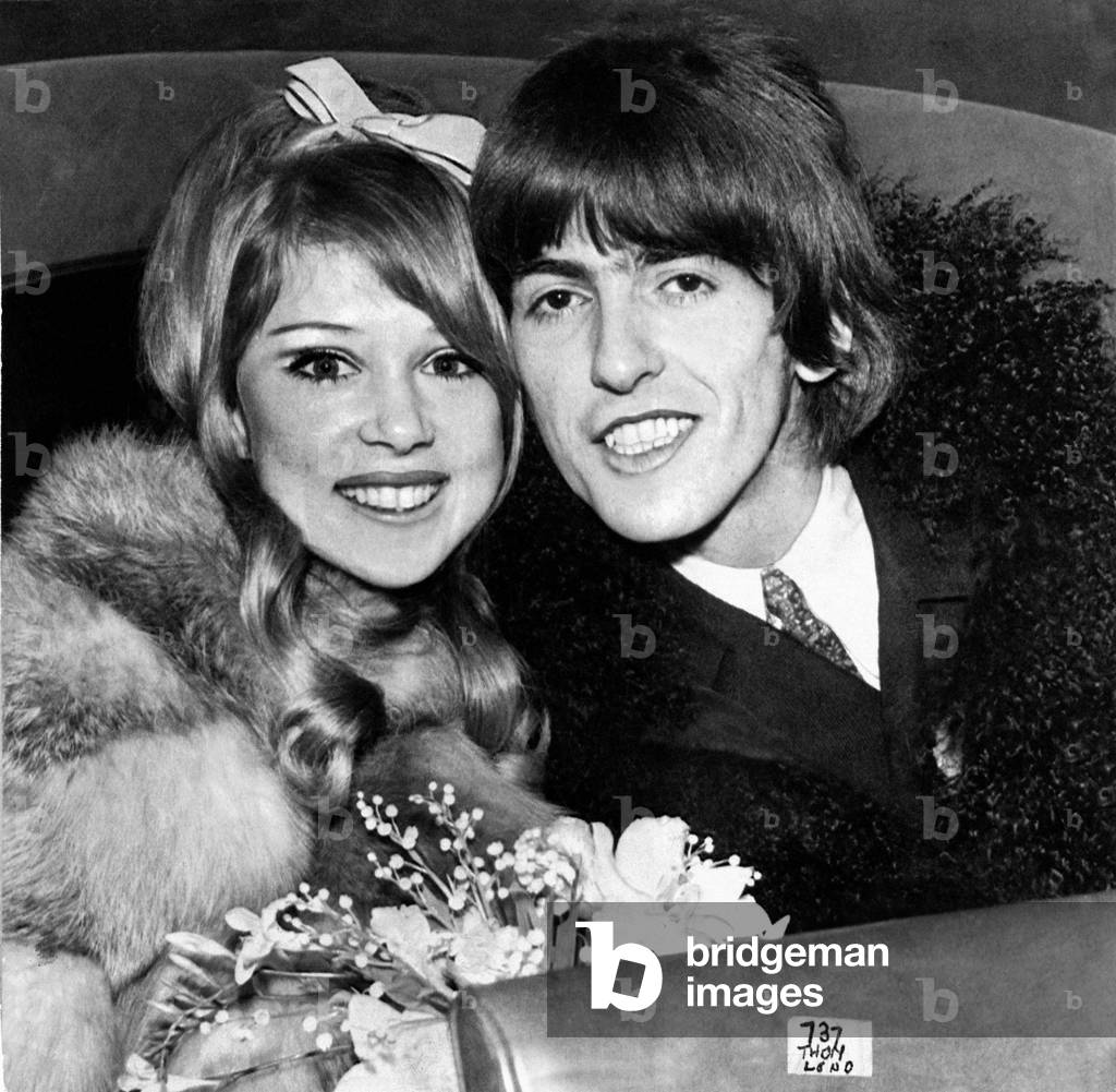 George Harrison of the Beatles pop group and his bride Patti Boyd, a former top model, pictured after they were married at Epsom Register Office yesterday. They had no immediate honeymoon plans and will be staying at George's bungalow in Esher leaving Paul McCartney the only bachelor Beatle. 22nd January 1966 (b/w photo)
