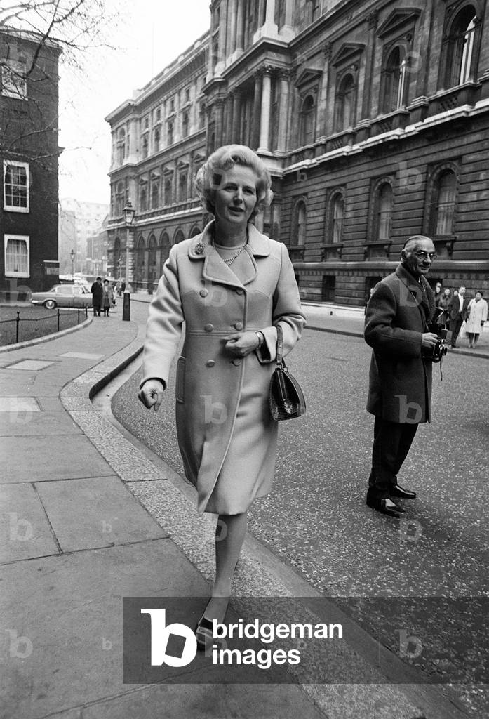 Margaret Thatcher, leaving 10 Downing Street after cabinet meeting, December 1970 (b/w photo)