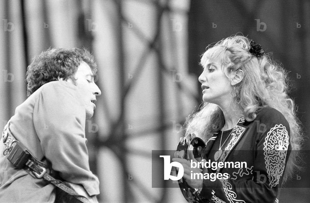 Bruce Springsteen and Patti Scialfa, member of Bruce Springsteen's E Street Band, in Concert, Villa Park, Birmingham, Tuesday 21st June 1988 (b/w photo)