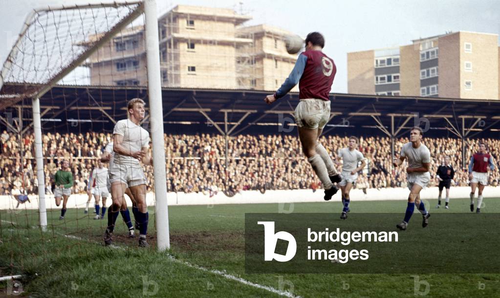 English League Division One match at Upton ParkWest Ham United 4 v Sheffield Wednesday 2Martin Peter leaps up high to score with a headerOctober 1965 (photo)