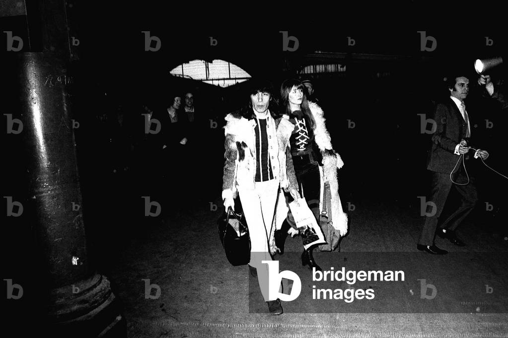 Rolling Stones: Bill Wyman & his girlfriend Astrid arrive at Newcastle Central Station before they play a gig at the Newcastle City Hall (first night of their UK tour) on the same day as the band announced they were going to become tax exiles by moving to France, Thursday 4th March 1971