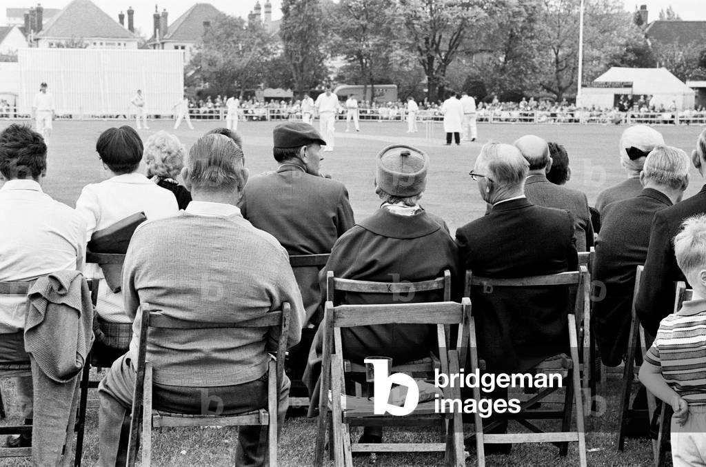 For the first time County cricket was played on a Sunday. The match between Essex and Somerset took place at Valentine's Park in Ilford. Crowds in chairs watching the match. 15th May 1966 (b/w photo)