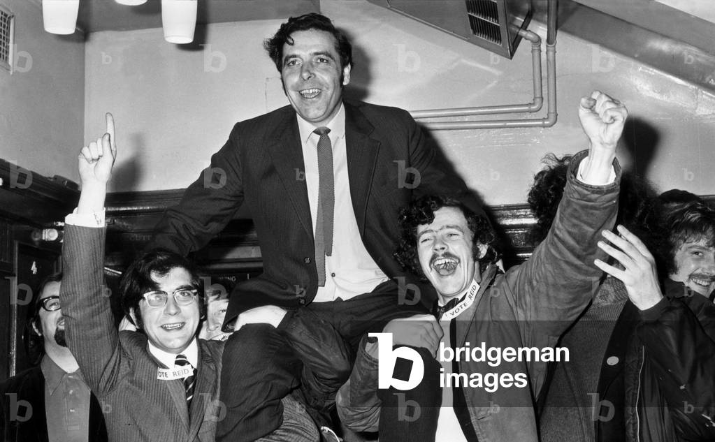 Shouldered by cheering students, UCS shop stewards leader Jimmy Reid, on hearing news that he has been elected Rector of Glasgow University 25th October 1971 (b/w photo)