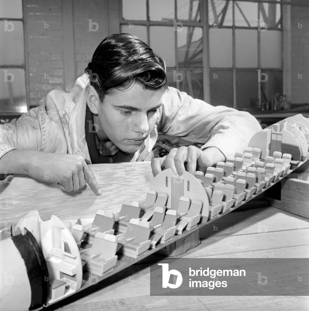 Factory where model aircraft for the travel agents are made. Men making model planes. Circa 1960