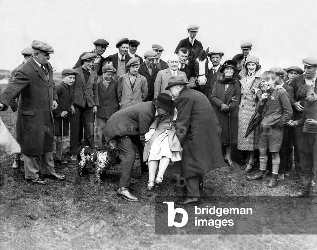 Crowds gatherd round the Dunting Stone at Newbiggin for the Riding of the Bounds ceremony in 1931