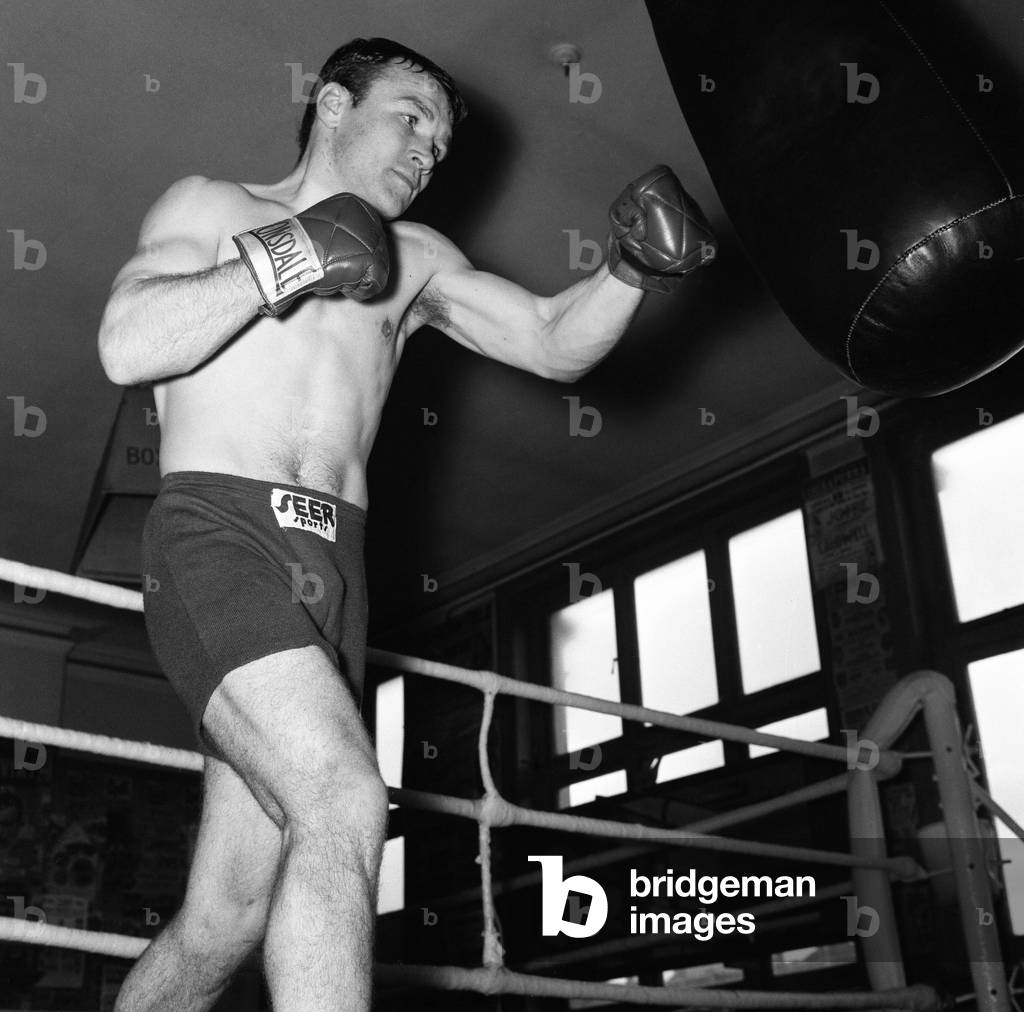 British Lightweight champion boxer Dave Charnley training at the Thomas A' Beckett gym in Bermondsey in preparation for his title defence against Maurice Cullen at Belle Vue, Manchester.
6th May 1963.