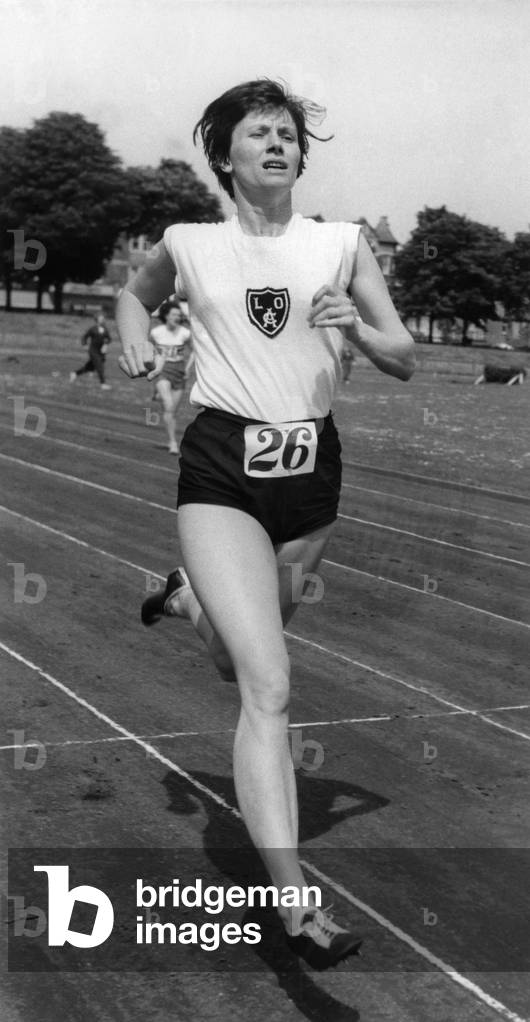 Middlesex Ladies' Atheletic Meeting, Broomfield Park, Southgate. Dianne Leather seen winning the 440 yards final. She also won the 880 final. Lives at 39, Loom Lane, Radlett Herts. May 1959