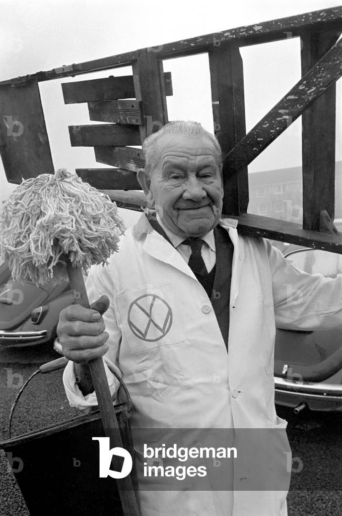 91 years old Mr. Ernest Hawk Turner who celebrates his birthday still does a young man's job of work. He prepares VW Beetles for delivery.. December 1969