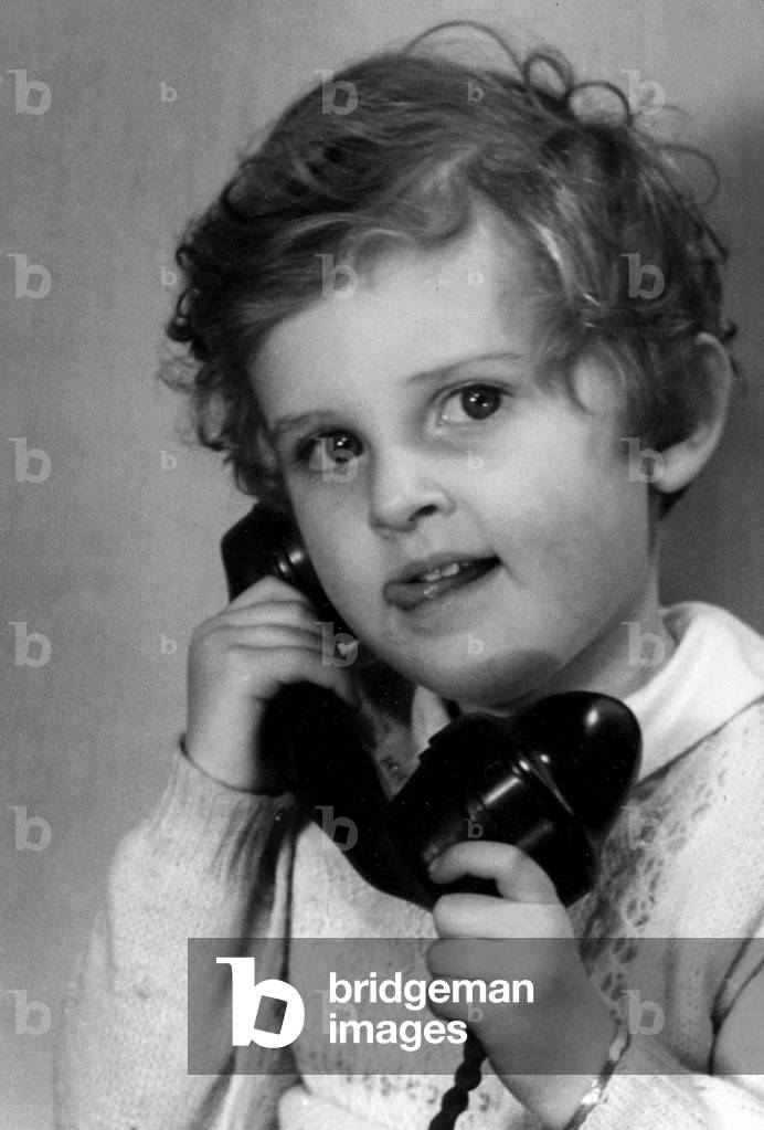 Young boy talking on the telephone
Circa 1945