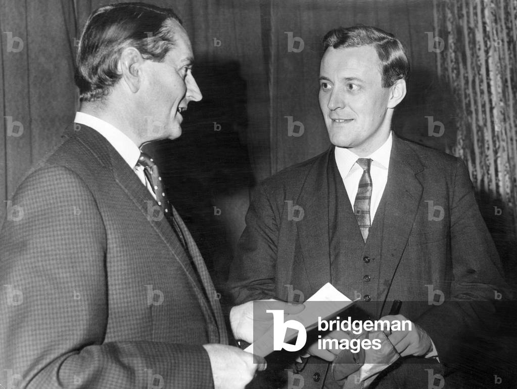 Tony Benn, was a British Labour Party politician who was a Member of Parliament (MP) for 50 years, died on 14 March 2014. Pictured here at a meeting in the Royal Hotel, Cardiff Business Club with Mr T Leslie Lowe, host for the evening. 21st October 1963 (b/w photo)