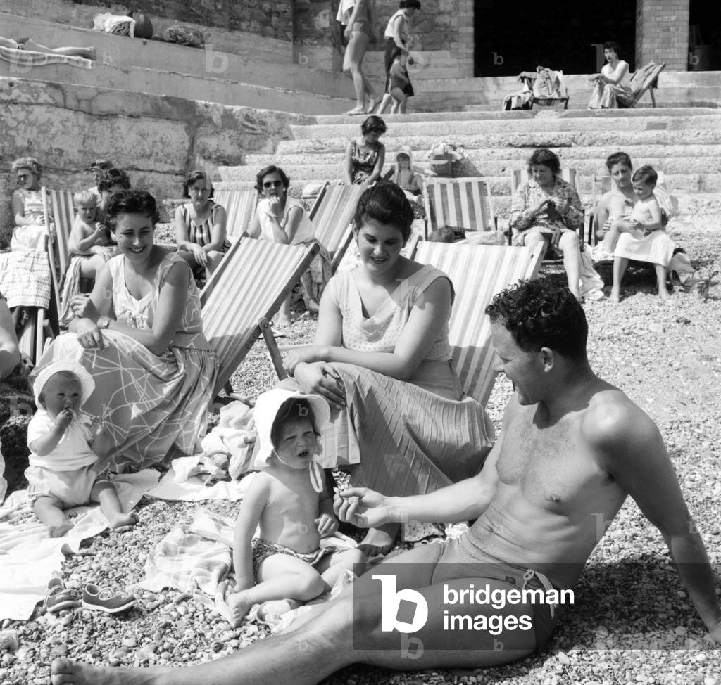 Families on the beach at Plymouth